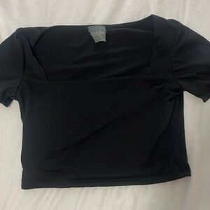 Black squared neck crop top.